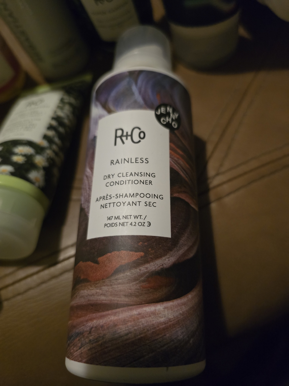 R+Co Rainless Dry Cleansing Conditioner — Brown and Marbled Purple Accent